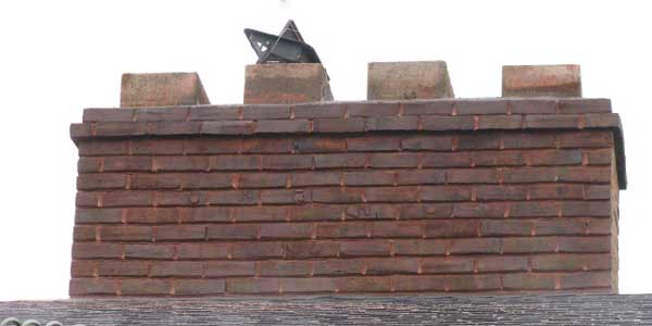 Chimney flue tile repair at Masonry Waterproofing & Drainage Masters in Portland OR and Vancouver WA