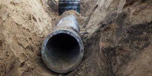Underground pipe. Underground Gutter Drainage by Masonry Waterproofing, and Drainage Masters in Portland OR and Vancouver WA