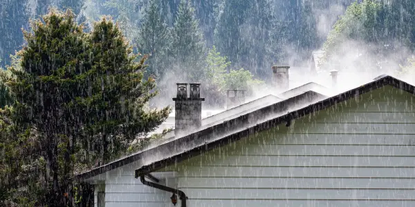 Steam Coming Off Roof During Heavy Rainfall